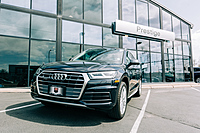 New Audi Q5 and "Prestige" sign.
