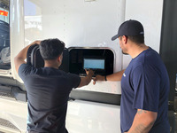 Robin and Reyes setting software at the end of a TriPac APU installation