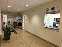 Cashier window adjacent to customer waiting area