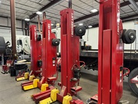 We have two sets of 4 column wheel lifts to lift a semi.  The capacity is 72,000 pounds.