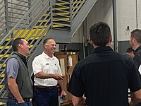 General Manager, Josh Carter, and Executive Vice President, Eric Ostrowsky, join the technicians for a celebration.