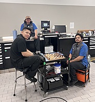 Our technicians enjoying a fun game of Chess during after hours. 