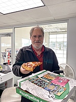 One of our all employee lunches featuring Joe, our Nissan Service Manager - National Pizza Day!