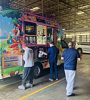 Hot Summer Days in Phoenix.
Has the Slushie Truck serve our associates.  