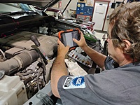 Robert working on a Digital Vehicle Health Inspection. We use Auto Vitals and it is detailed to where you can really get great information out to the front office in an easy-to-follow format, every tech gets paid for their time to do these inspections. The front office estimates the work the vehicles needs and that is all sent to the client for their review and approval.