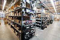 Parts warehouse. Over $2 million dollars of inventory and 90%+ off the shelf fill rate will deliveries directly to the tech's stall.