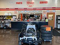 Showroom: Pic is looking from front door to parts & service departments. Nice & open concept. Customers can see right into the shop.
