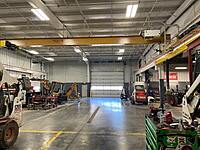 Shop has a 10,000 crane to hoist heavy equipment off of a trailer/truck. Saves time & is a lot more safer than using chains.