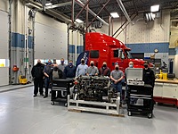 Big donation of an A26 Navistar engine and tools. Pictured are representatives from Navistar and Lakeside International along with the diesel faculty. 