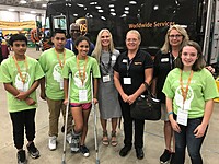 Kathy Martin Harrison,owner of Ed Martin Automotive, involved with students at Junior Achievement.  Her passion is growing the future one child at a time.