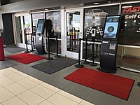 Check in Kiosks on the service drive.