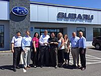 Receiving an Award from Subaru of America.