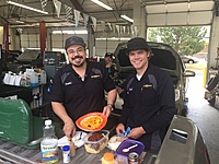 Shop lunch on the tailgate of employee truck