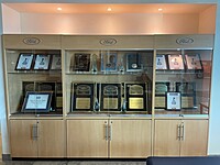 Showroom Trophy Case -- So many President's Awards we can't display all of them!