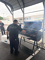 Edgar Cruz, Shop Foreman, grilling for our Friyay Cookout! 