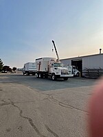 three service trucks w/cranes . 