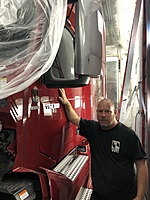 BODY SHOP TECHNICIAN & PAINTER BRIAN WOLFENBARGER PREPARES ACCIDENT DAMAGE TRUCK FOR PAINTING