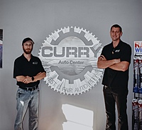 Service Advisor, Kyle, on left and Owner, Sam, on Right 