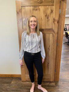Sara wearing an outfit that is appropriate for a technician interview.
