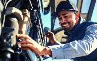 mechanic working on vehicle