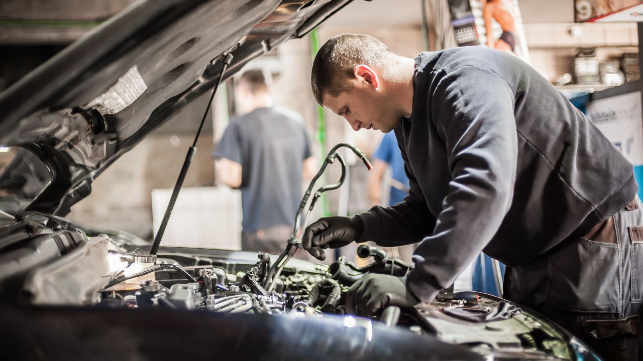 Mechanics working in an automotive shop