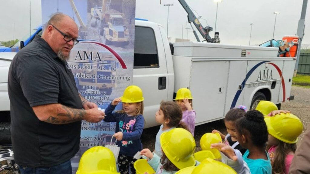 Shop presenting diesel to young students at school