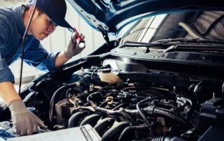 Mechanic working on a car